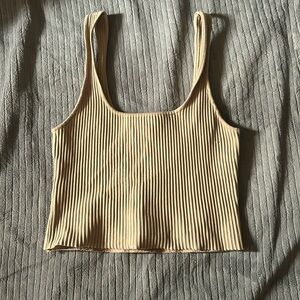 A forever 21 medium sized tank top that’s tan
